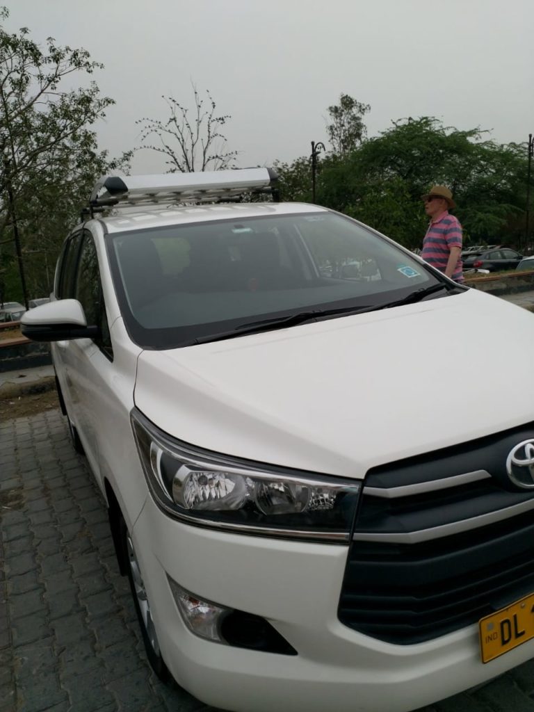 car crysta booking from gurugram